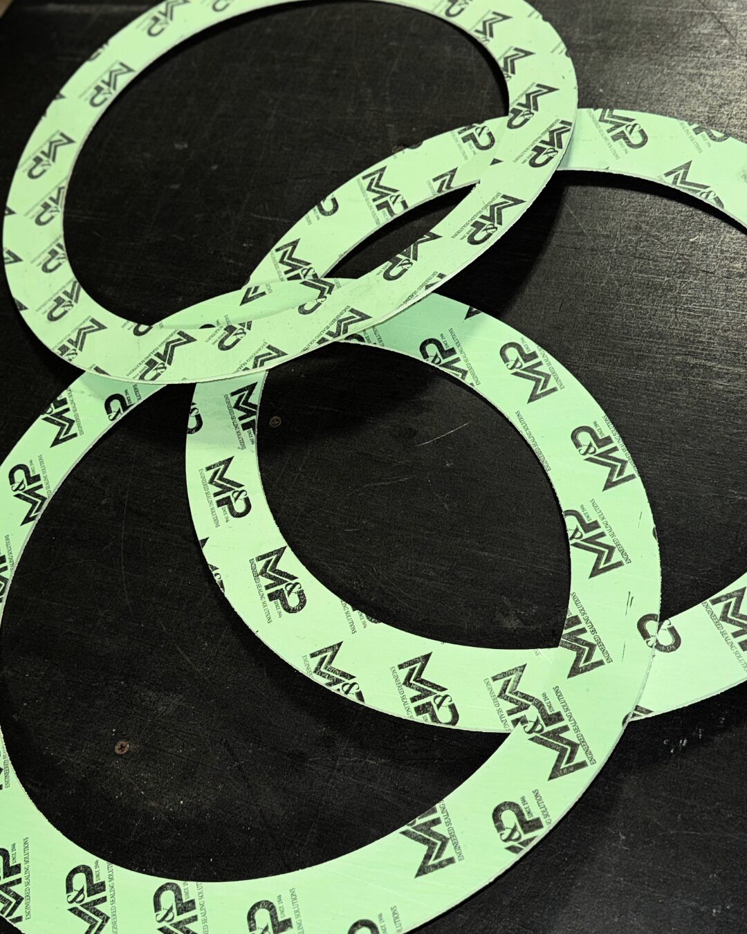 M&P branded soft CNA gasket made from compressed non-asbestos material for industrial sealing applications