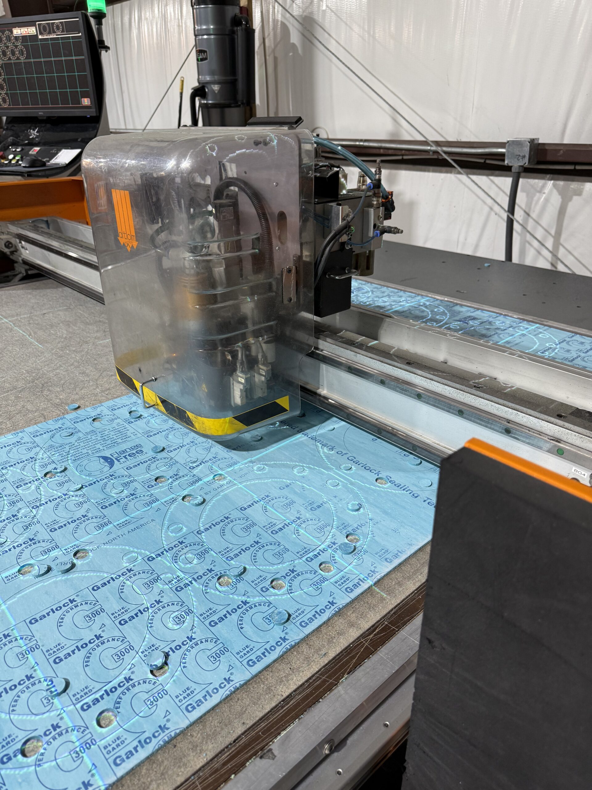 Flash cutting machine precision cutting Garlock gasket material for custom industrial sealing applications