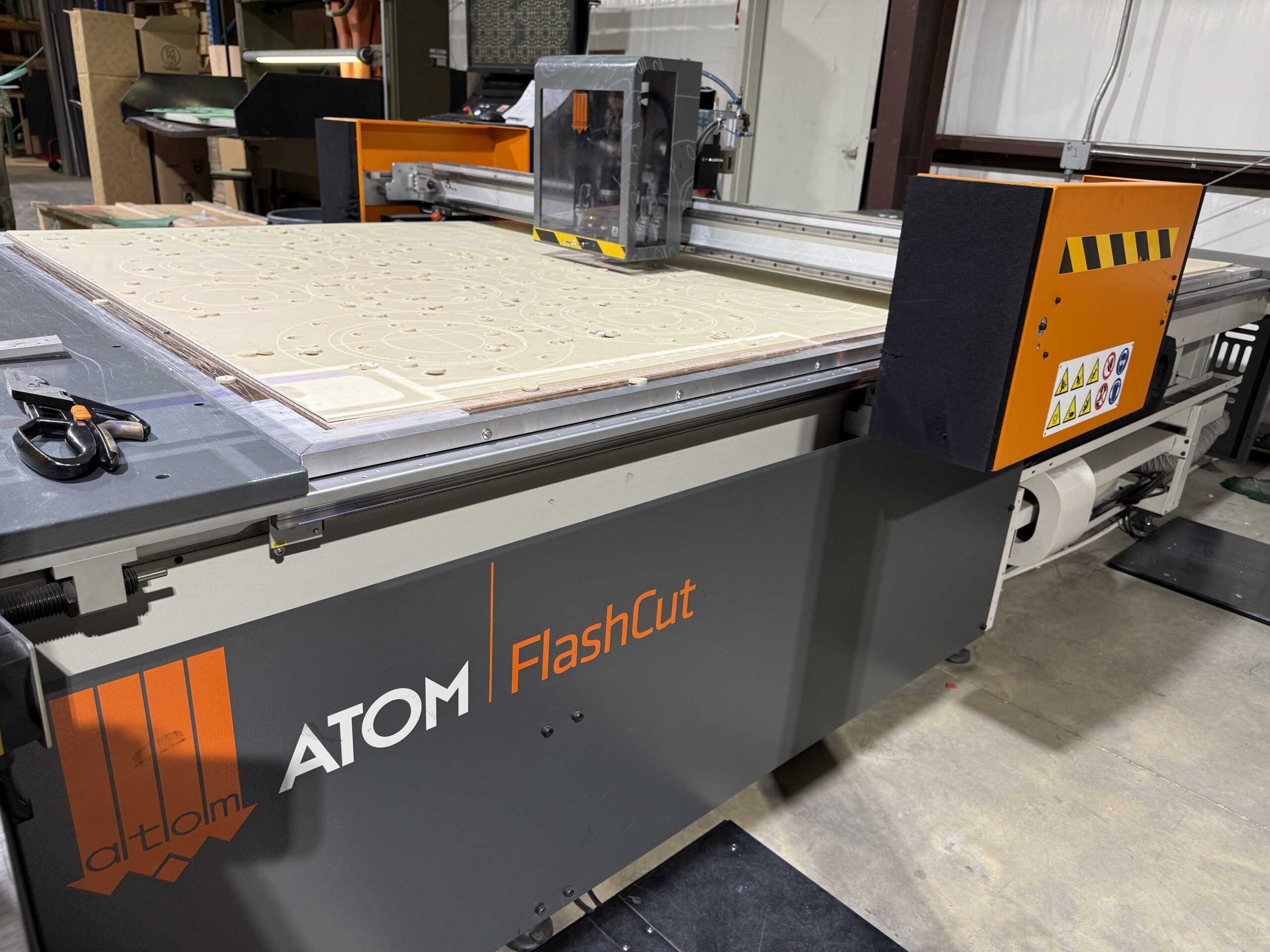Industrial flash cutting machine used to manufacture custom gaskets and sealing components with precision and efficiency